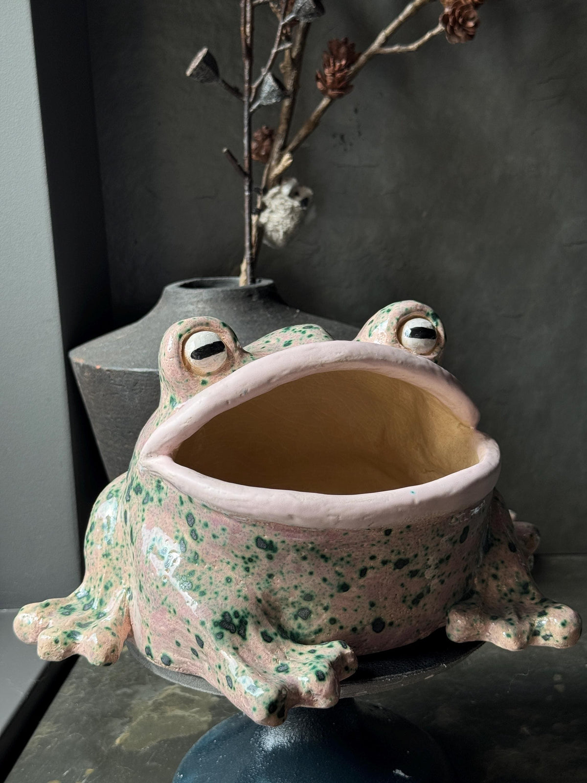 Front view of the finished ceramic frog container with open mouth
